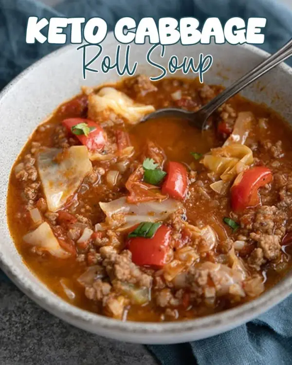Bowl of delicious cabbage roll soup garnished with herbs