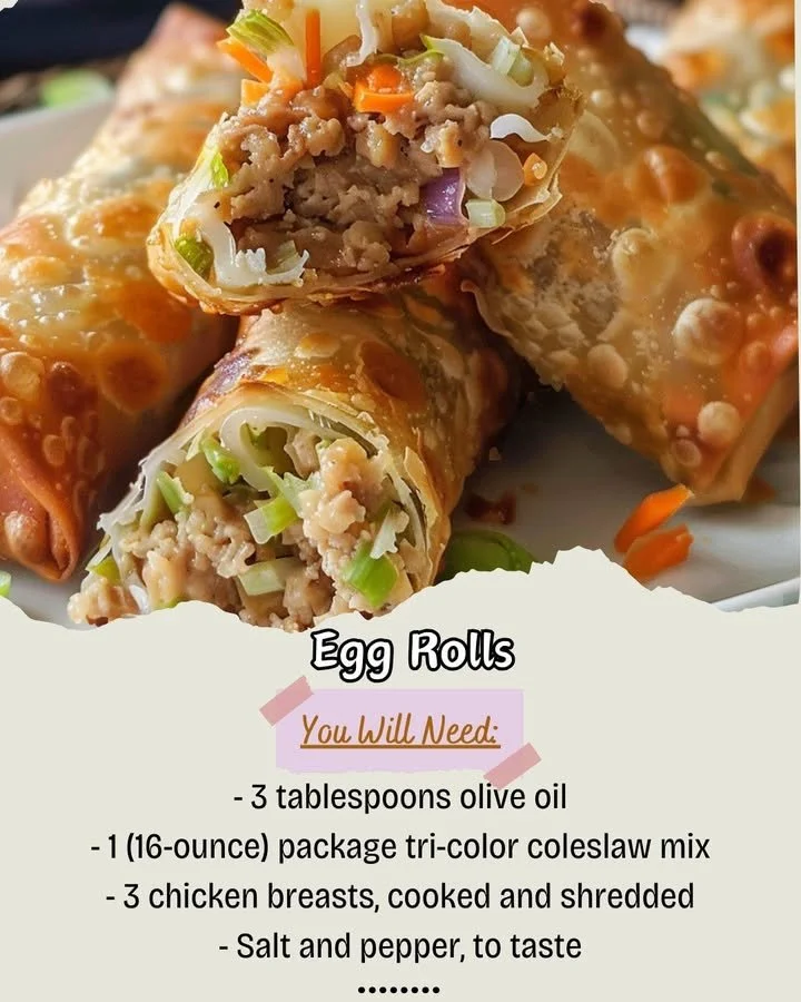 Plate of crispy egg rolls with dipping sauce on a wooden table