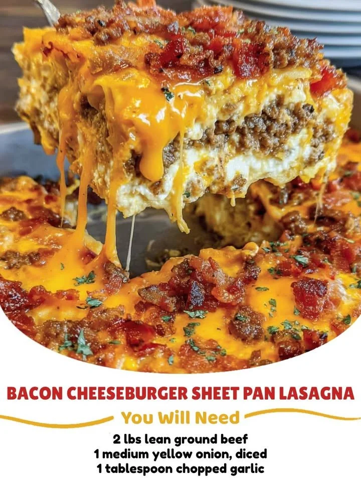 Delicious Bacon Cheeseburger Lasagna in a sheet pan, layered with beef and cheese