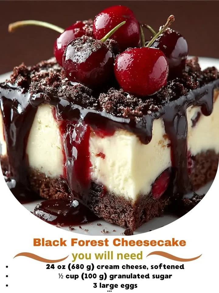Delicious Black Forest Cheesecake topped with cherries and whipped cream.