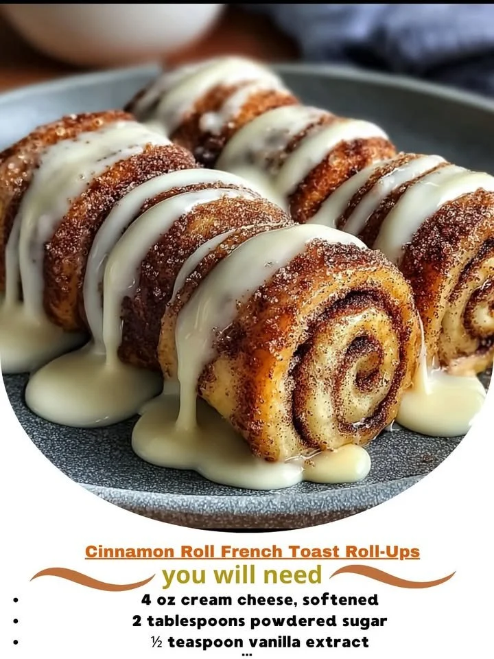 Cinnamon Roll French Toast Roll-Ups served with syrup and powdered sugar.