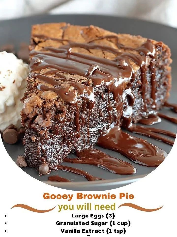 Delicious gooey brownie pie topped with chocolate drizzle and walnuts