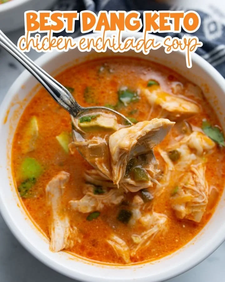 Bowl of Keto Chicken Enchilada Soup topped with cheese and cilantro