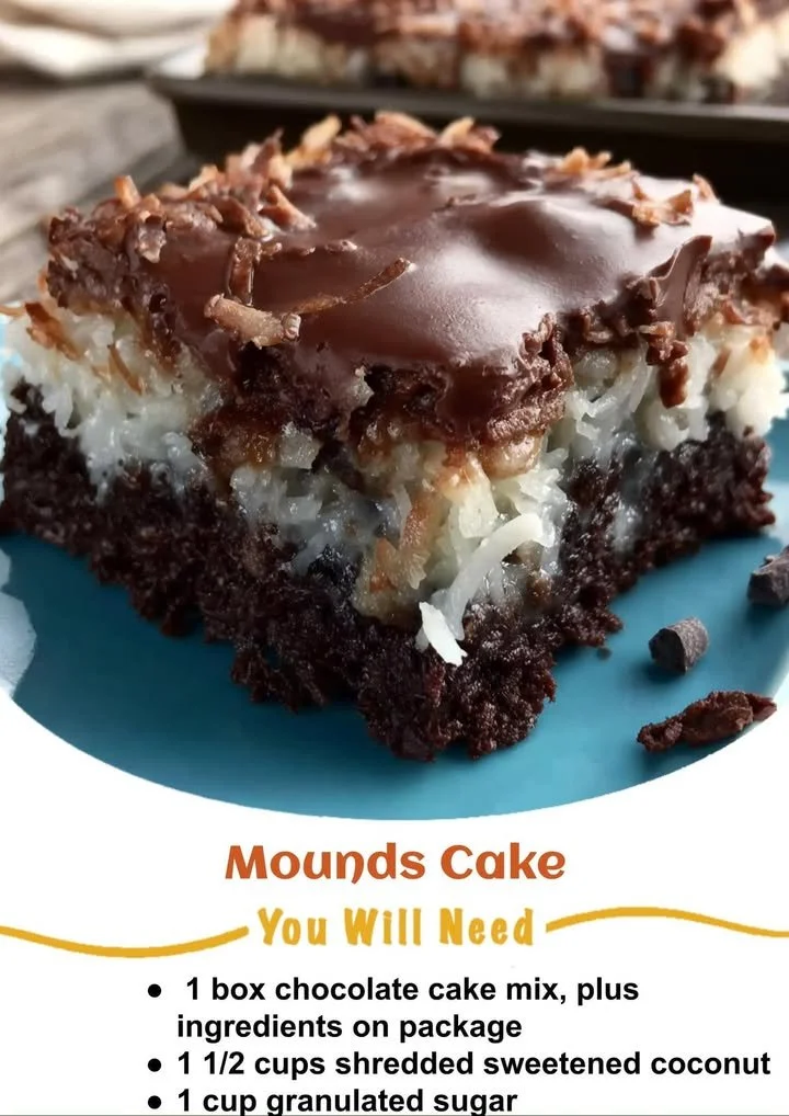 Delicious slice of Mounds Bar Cake topped with chocolate and coconut