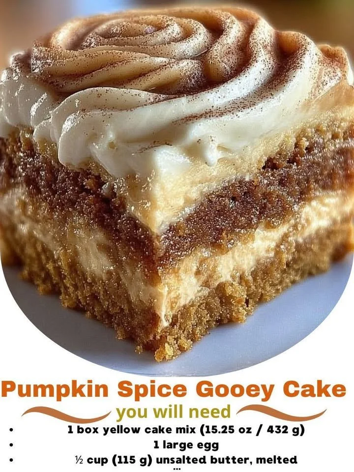 Delicious Pumpkin Spice Gooey Cake served on a rustic wooden table