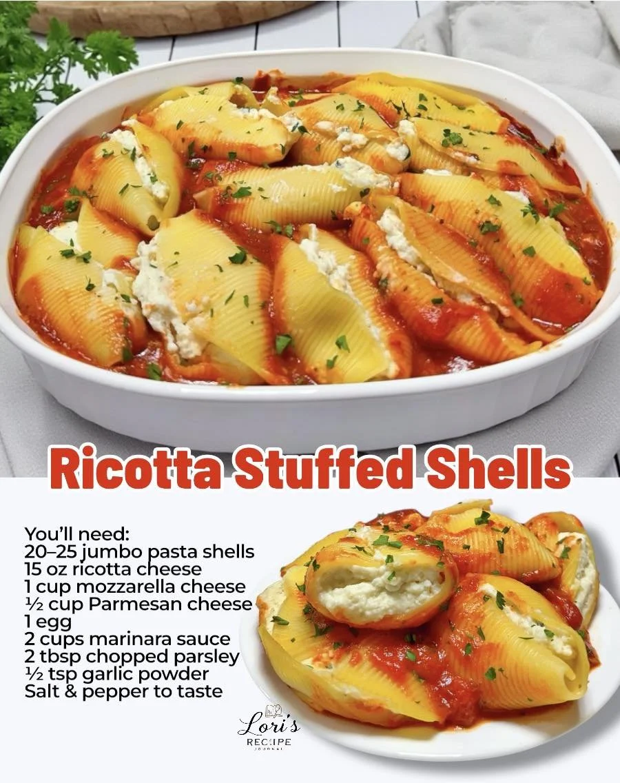Plate of homemade ricotta stuffed shells with marinara sauce and herbs.