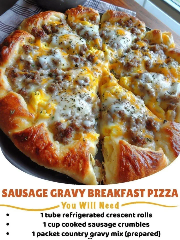 Sausage gravy breakfast pizza topped with herbs and cheese
