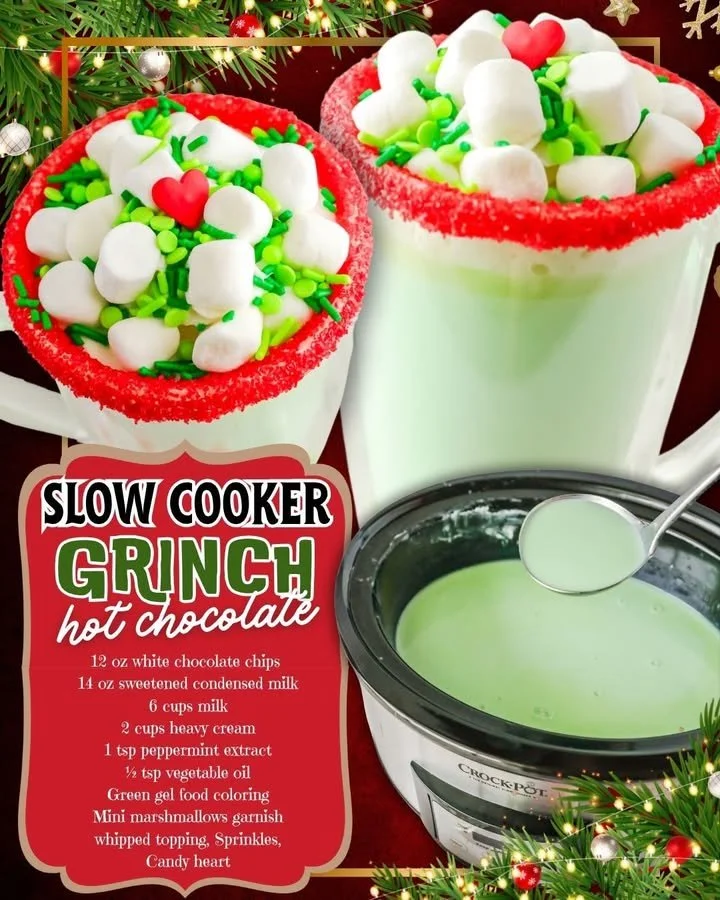 Delicious slow cooker Grinch hot chocolate topped with whipped cream and festive sprinkles.
