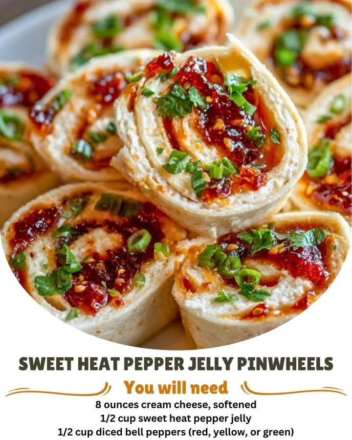 Sweet Heat Pepper Jelly Pinwheels served on a platter with fresh herbs.