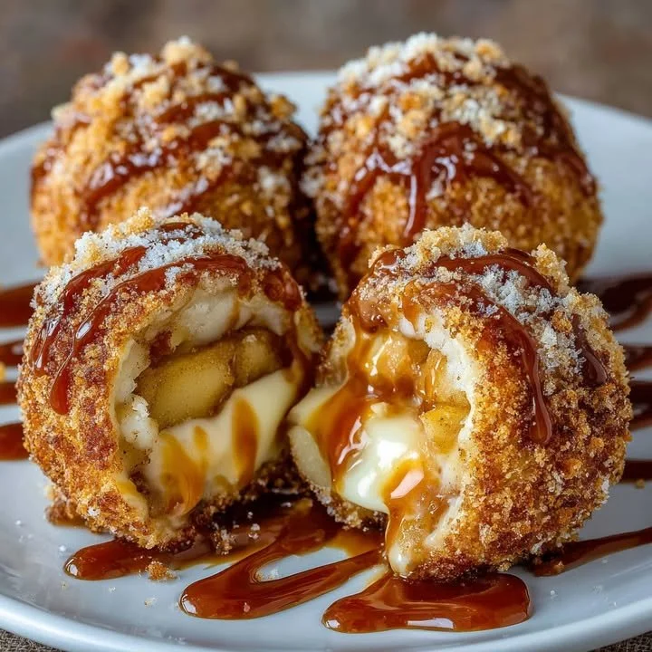 Delicious caramel apple pie bombs topped with caramel sauce