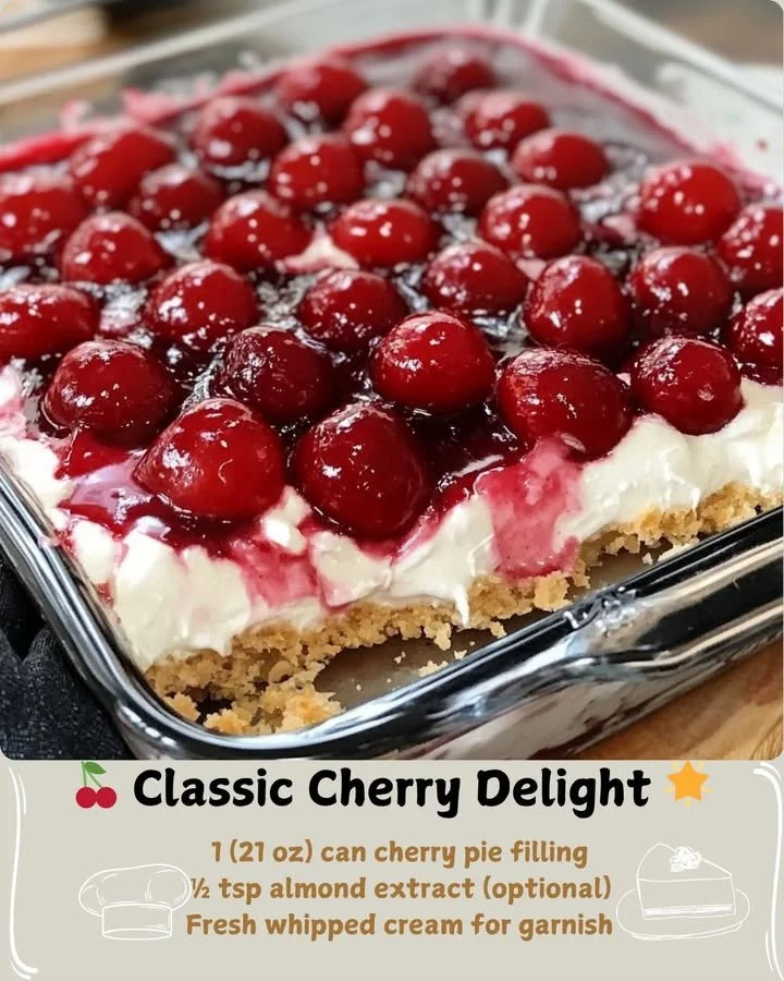 Slice of Classic Cherry Delight dessert on a plate with cherries