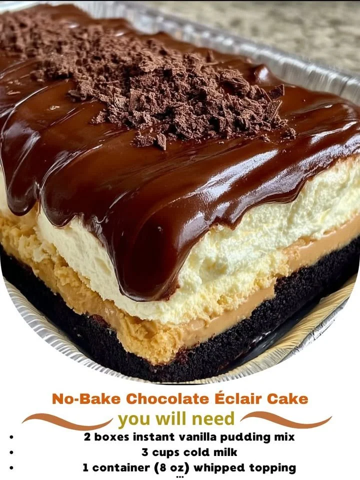 No-Bake Chocolate Éclair Cake topped with chocolate ganache and whipped cream.